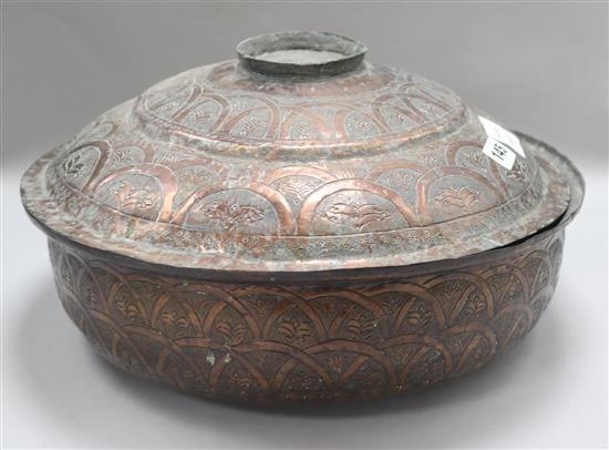 A Persian copper bowl and cover